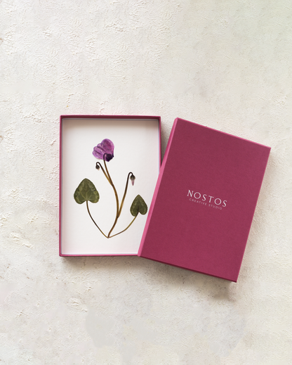 Handmade pressed flower art and botanical decor. Discover meaningful floral gifts crafted with love at Nostos Creative Studio.